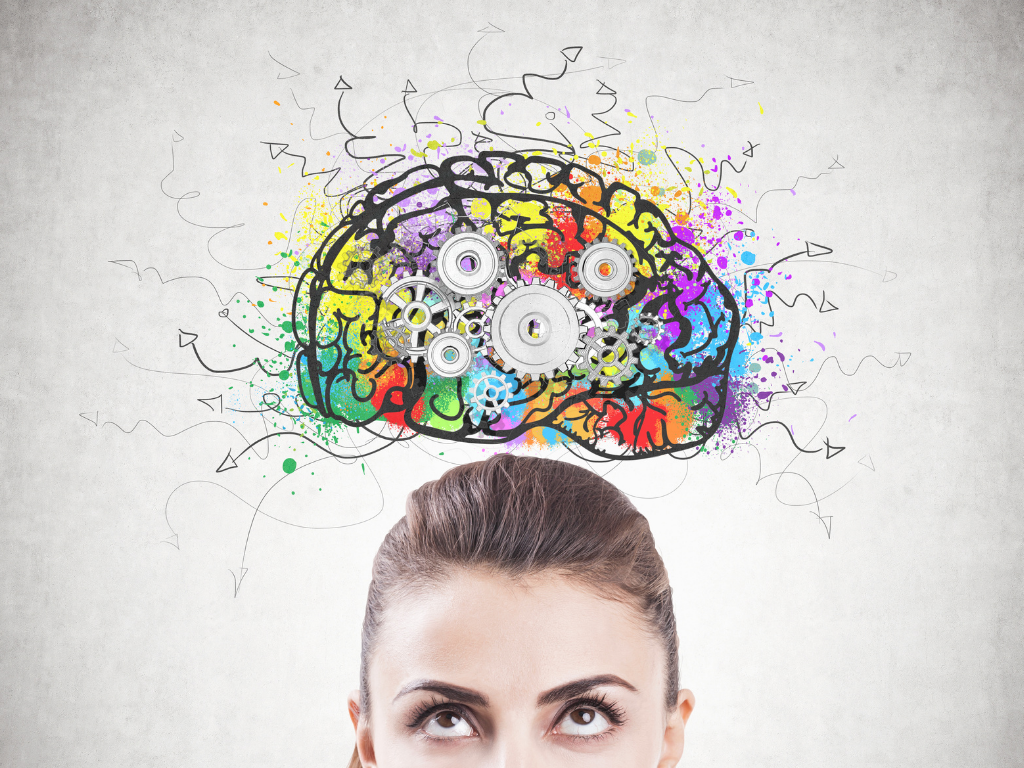 Colorful brain above girl; MCAT critical thinking.png