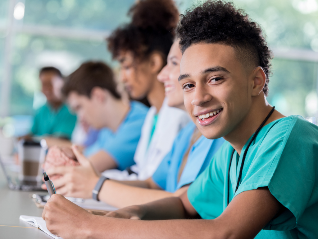 Medical student smiling; MCAT study plan